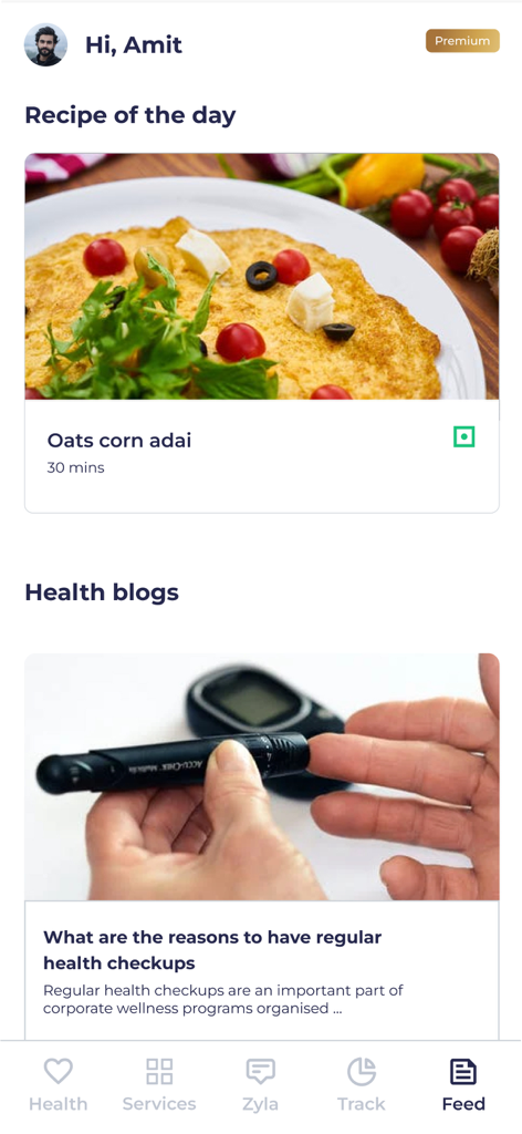 Ein Screenshot des Zyla App-Feeds, der ein gesundes Rezept für Oats corn adai und einen Blogbeitrag über die Bedeutung regelmäßiger Gesundheitschecks zeigt