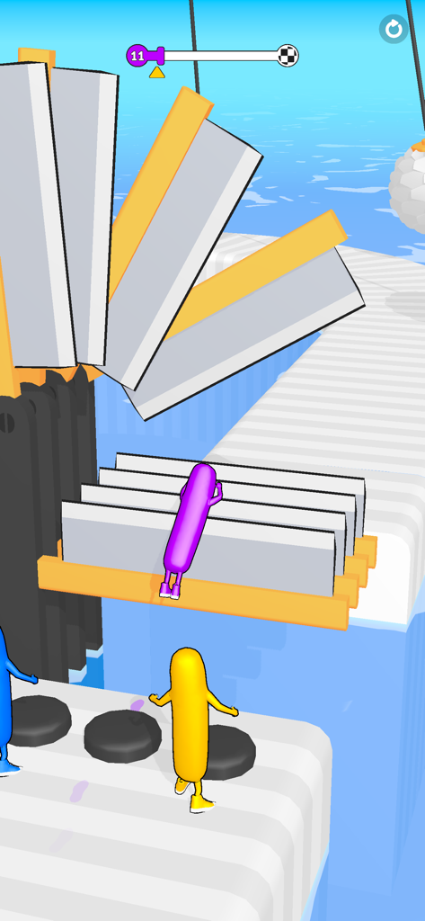 A purple character jumping over sharp blades in the Wacky Run 3D obstacle race game