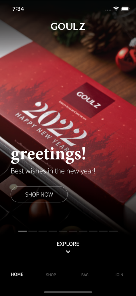 GOULZ app home screen featuring a luxury chocolate gift box and Happy New Year greetings.