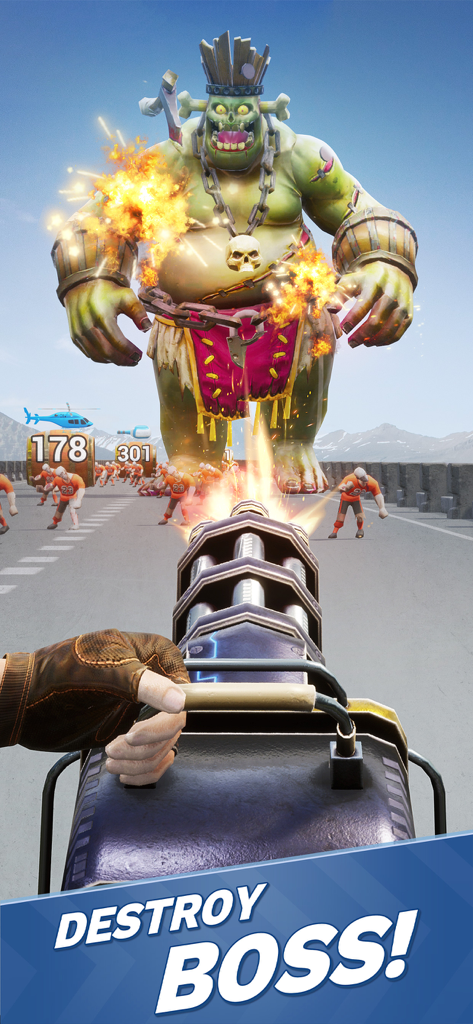 Zombie Waves-shooting game - Ego-Perspektive des Abfeuerns eines Miniguns auf einen riesigen grünen Zombie-Boss