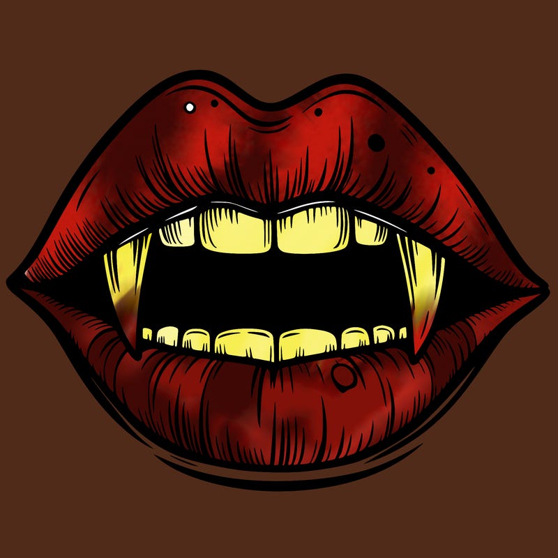 lips with vampire teeth
