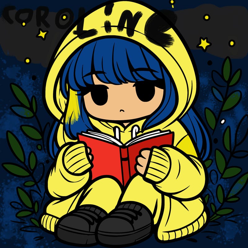 girl in oversized hoodie reading a book