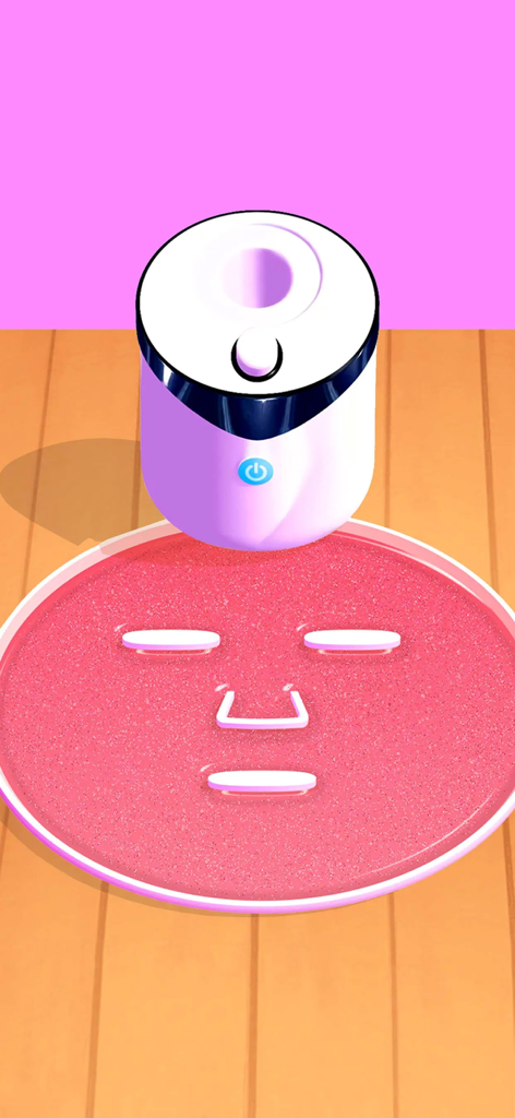 DIY Makeup - A pink glittery face mask being formed in a tray from a DIY makeup machine