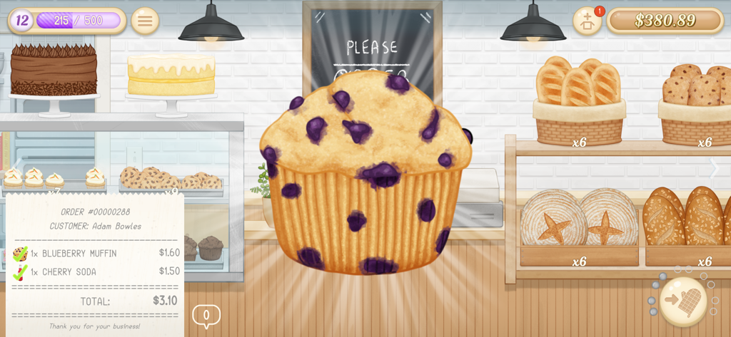 Baker Business 3 - Gameplay screen of Baker Business 3 showing a blueberry muffin and bakery shop interior
