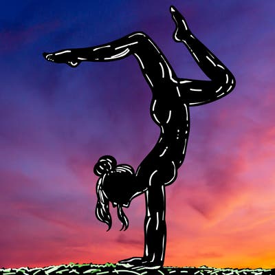 a woman doing a handstand