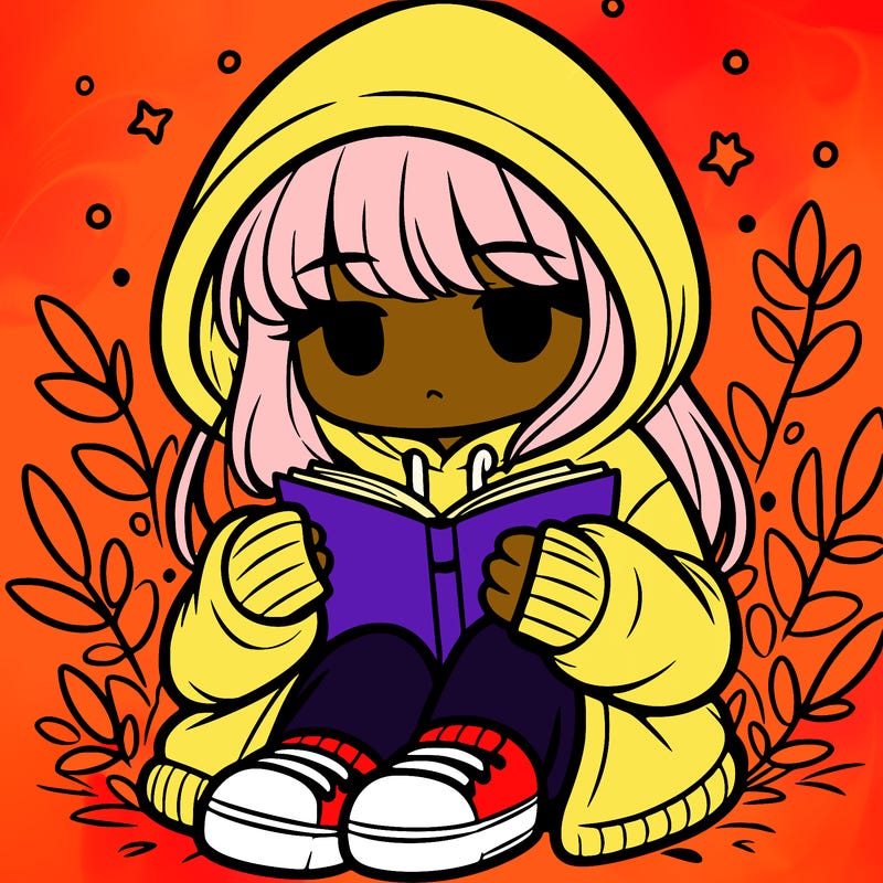 girl in oversized hoodie reading a book