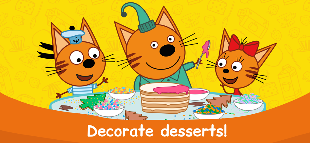 Kid-E-Cats Cooking at Kitchen! - Three orange cats from Kid-E-Cats decorating a cake and cookies