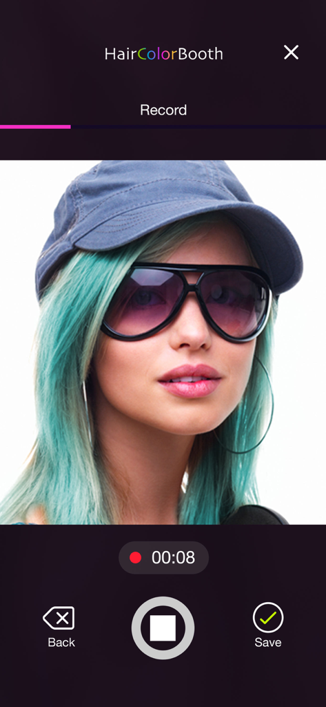 Hair Color Booth™ - A woman with teal hair using the recording feature in the Hair Color Booth app interface