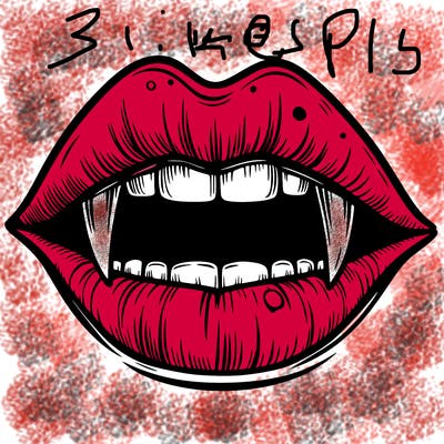 lips with vampire teeth