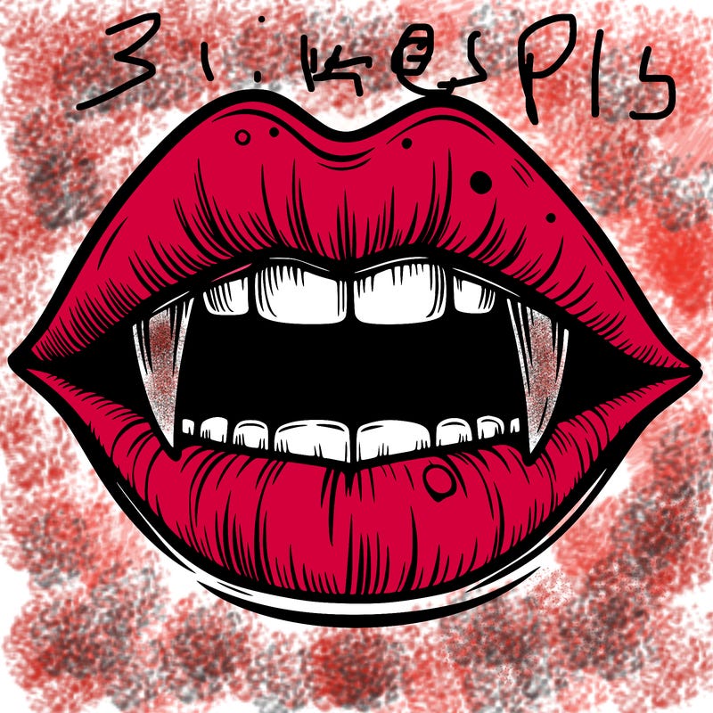 lips with vampire teeth