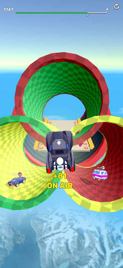 Ramp Racing 3D — Extreme Race - A car jumping through the air towards three giant colorful track loops in a 3D racing game