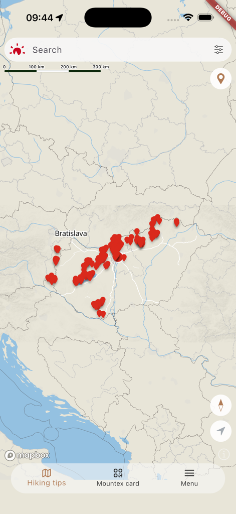 Mountex - A map of Hungary in the Mountex app showing various hiking trail locations with red markers.