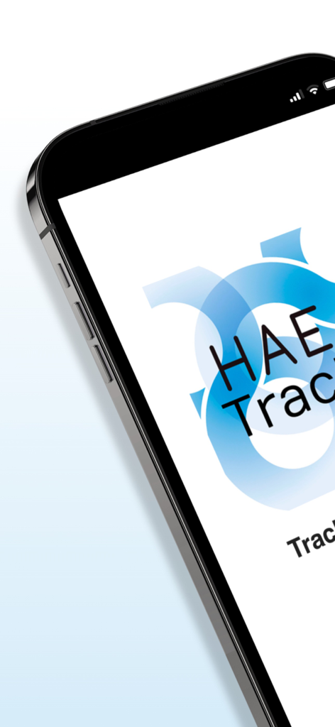 HAE TrackR app logo displayed on a smartphone screen