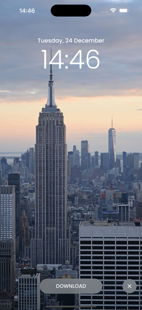 IPhone lock screen preview of a 4K live wallpaper featuring the New York City skyline and Empire State Building at sunset