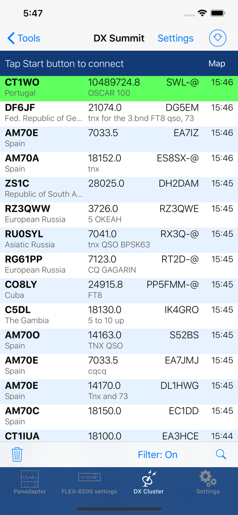 A screen showing a list of DX spots with callsigns and frequencies in the SmartSDR app