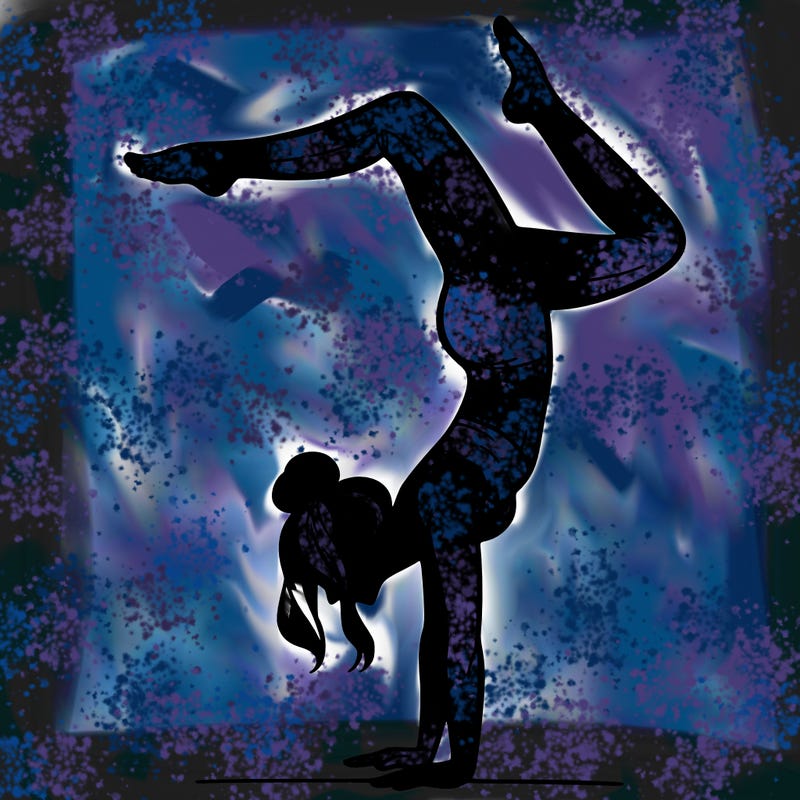 a woman doing a handstand