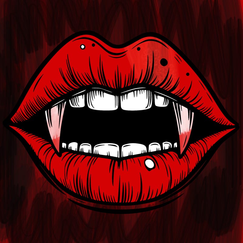 lips with vampire teeth