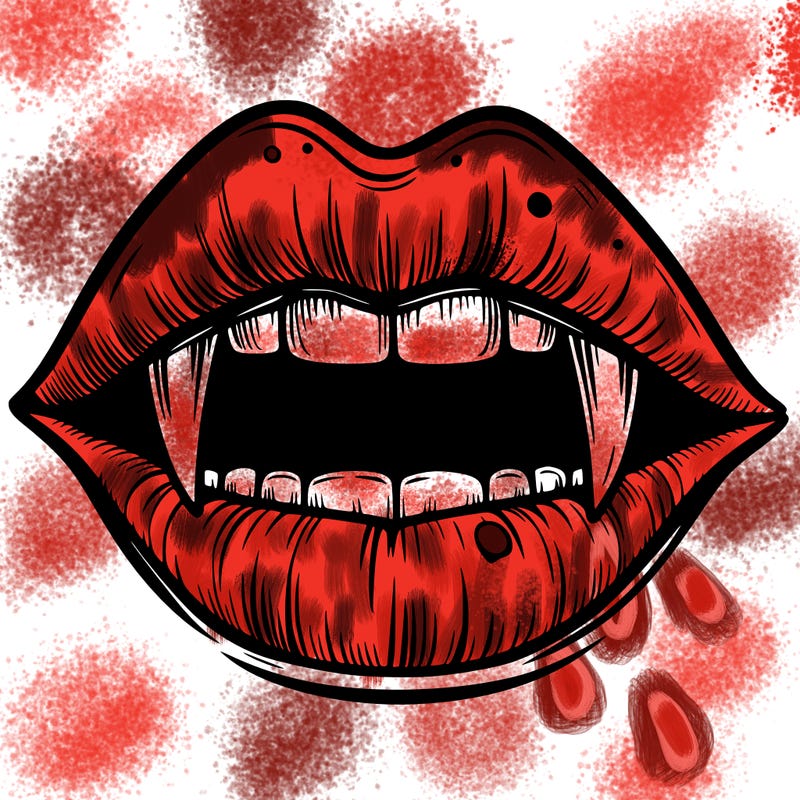 lips with vampire teeth