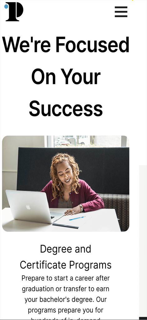A college student working on a laptop at the Community College of Philadelphia