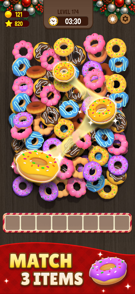 Pantalla del juego de rompecabezas Match Triple 3D mostrando coloridos donuts 3D y mecánicas de emparejamiento.
