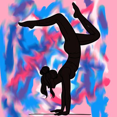 a woman doing a handstand