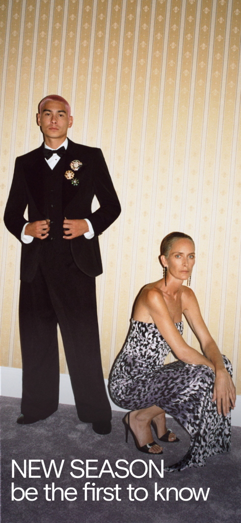 FARFETCH - Shop Luxury Fashion - Man in a tuxedo and woman in a designer dress showcasing new season fashion