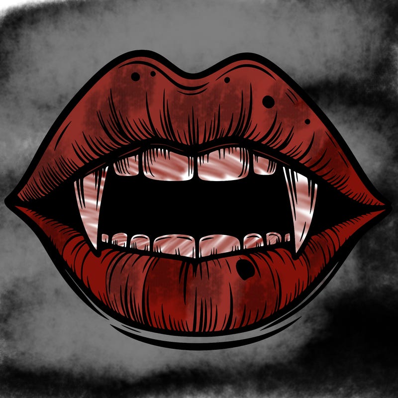 lips with vampire teeth