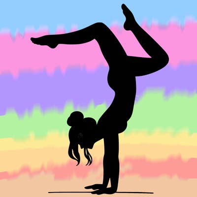 a woman doing a handstand