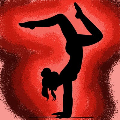 a woman doing a handstand