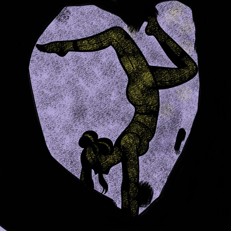 a woman doing a handstand