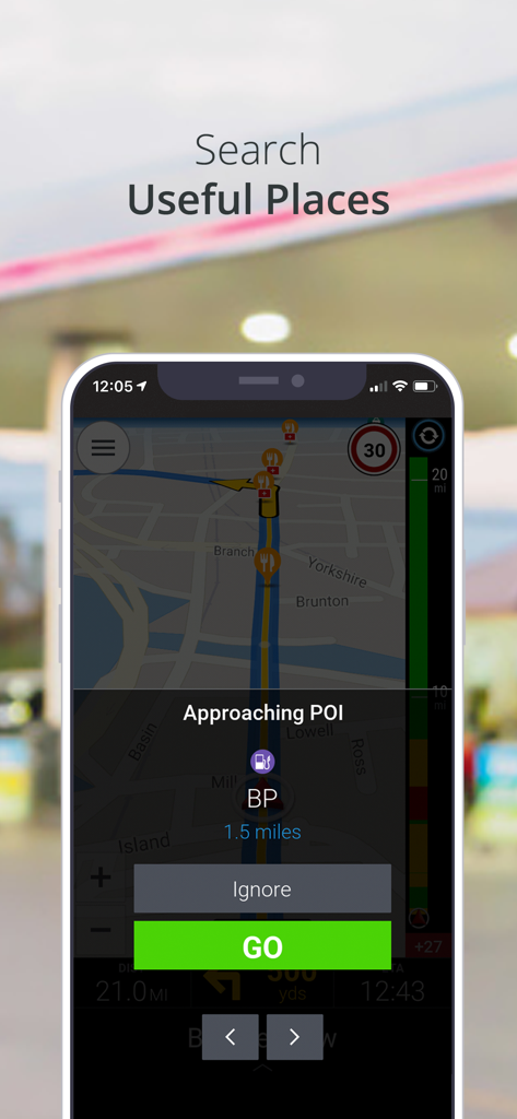 Aplicación CoPilot GPS Navigation mostrando búsqueda de lugares útiles con una alerta de gasolinera