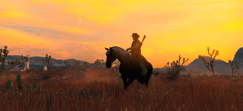 Una silueta de John Marston montando a caballo contra un atardecer en el desierto