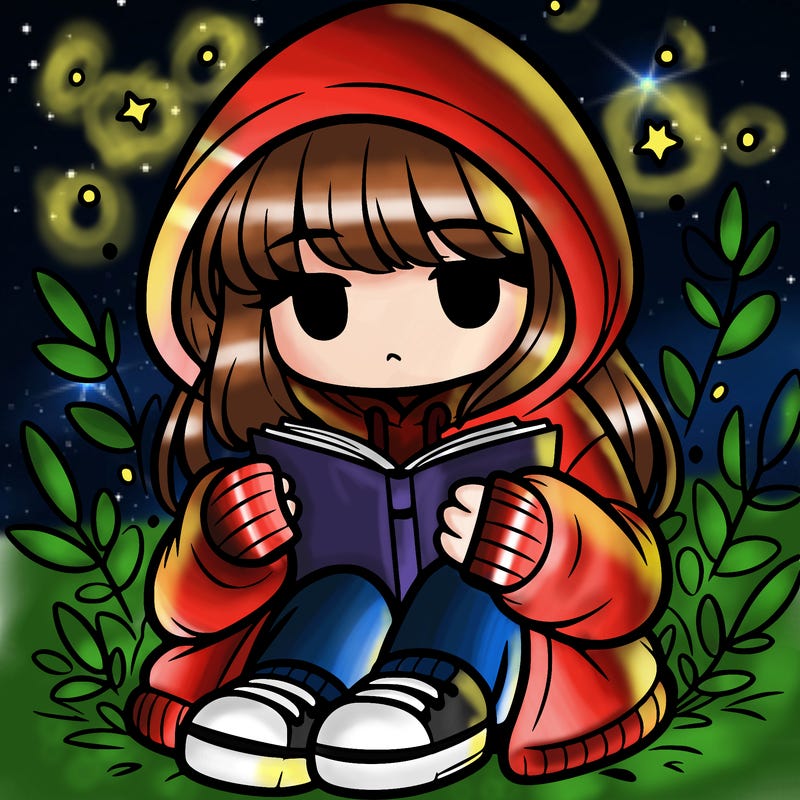 girl in oversized hoodie reading a book