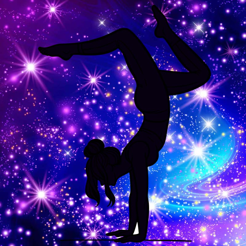 a woman doing a handstand