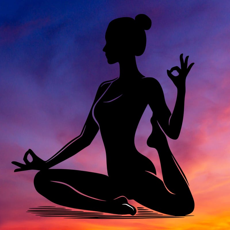 silhouette of a woman doing yoga