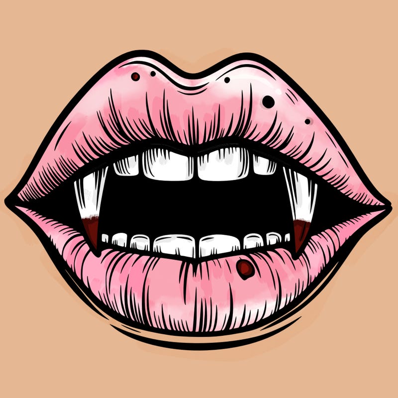 lips with vampire teeth