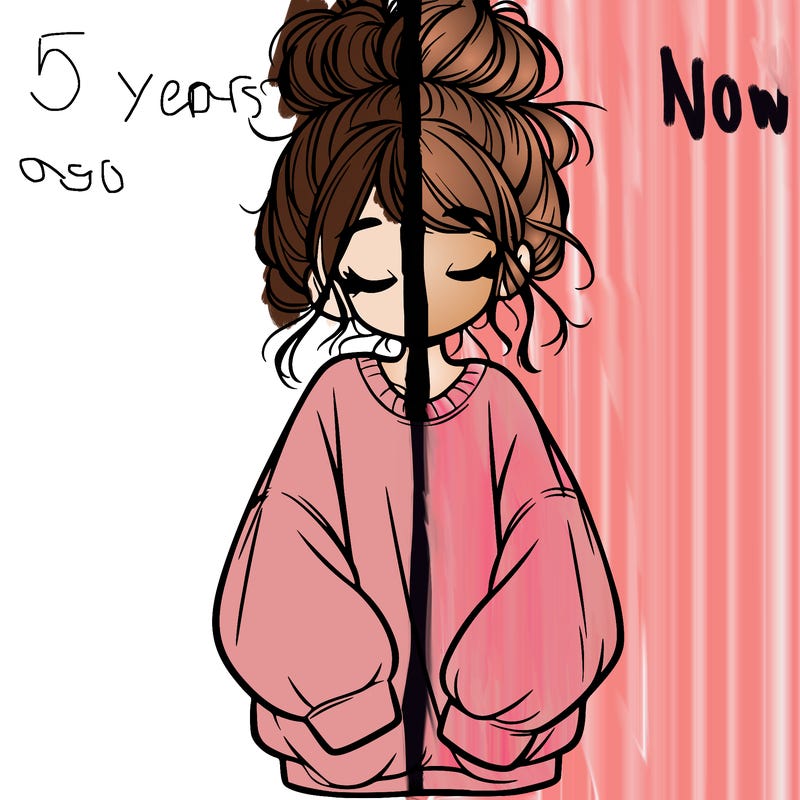 girl with baggy sweatshirt and messy bun