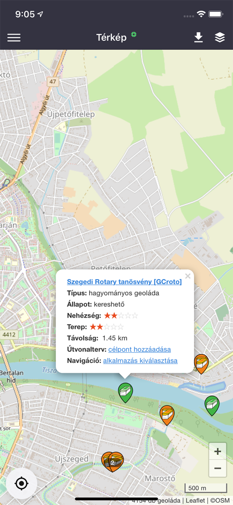 A screenshot of the Geoladak app showing a map of Hungary with geocache markers and a popup window displaying details for a specific cache in Szeged