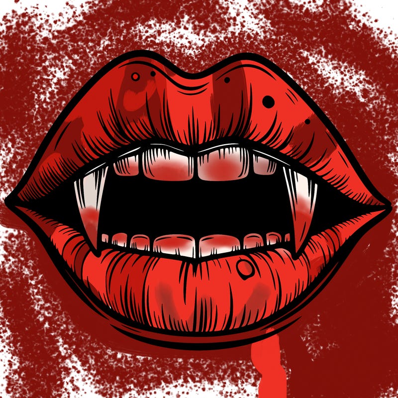 lips with vampire teeth