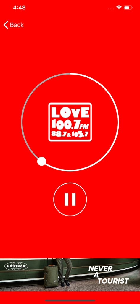 Radio Live Cyprus app player interface for Love FM station with a pause button on a red background