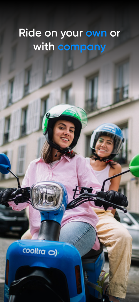 Two people wearing helmets riding a blue Cooltra electric moped together in a city