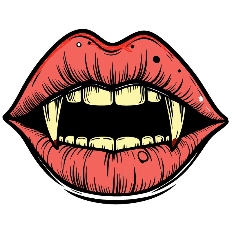 lips with vampire teeth