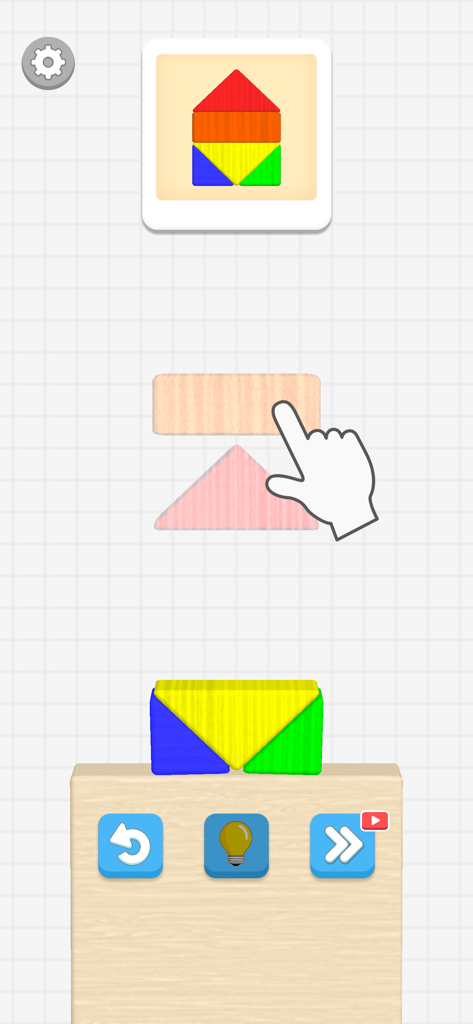 Color Block Builder - Una mano che tocca un blocco fluttuante per costruire una forma colorata nel gioco Color Block Builder.
