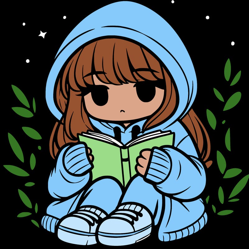 girl in oversized hoodie reading a book