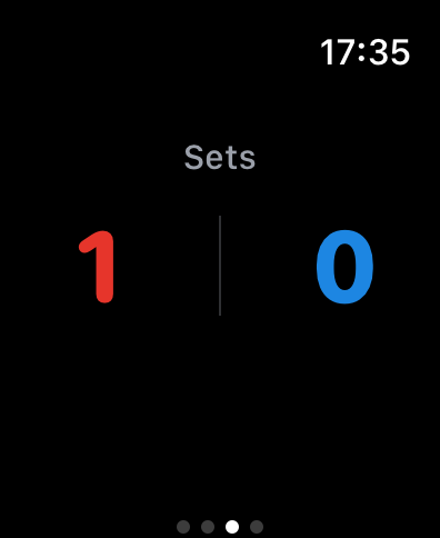 Interfaz de Apple Watch mostrando los marcadores de sets de tenis playa con grandes números rojos y azules