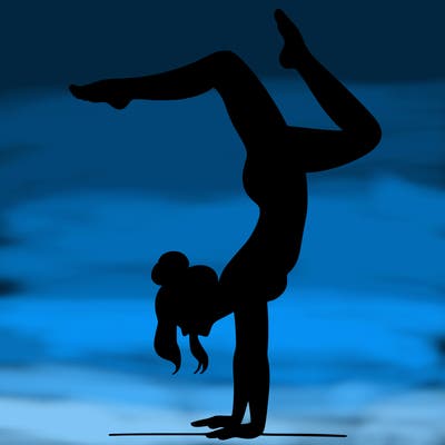a woman doing a handstand