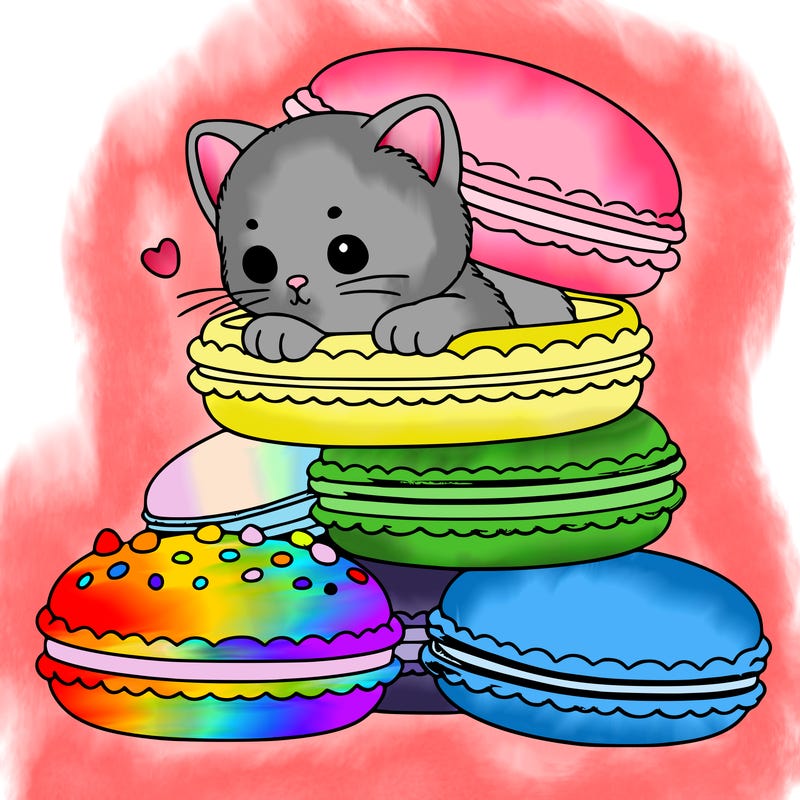 a kitten popping out of a stack of pastel macarons
