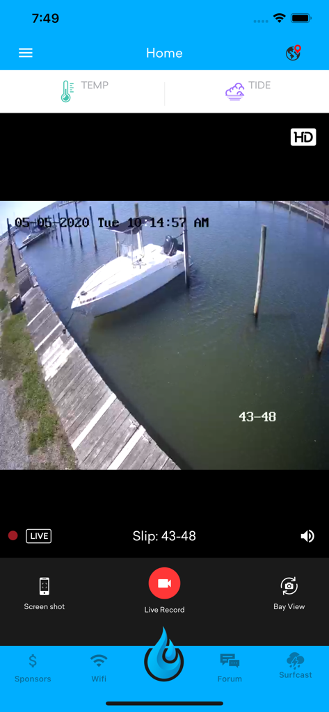 AquaVue - AquaVue mobile app displaying a live camera feed of a boat docked in a marina slip