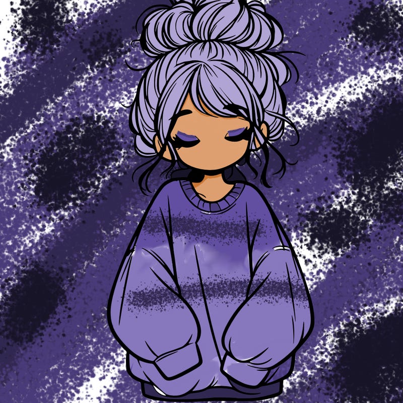 girl with baggy sweatshirt and messy bun