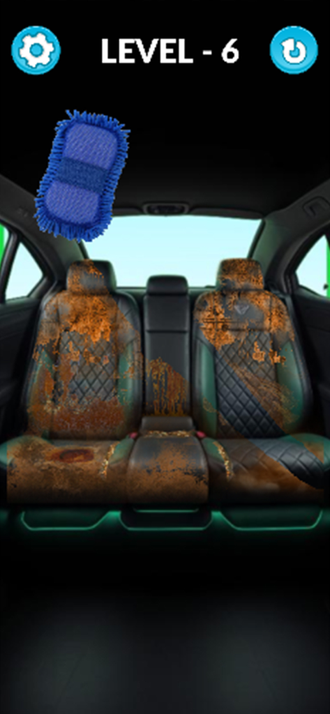 Satisfying Home Deep Cleaning - Uma esponja azul limpando assentos de carro sujos no jogo Satisfying Home Deep Cleaning